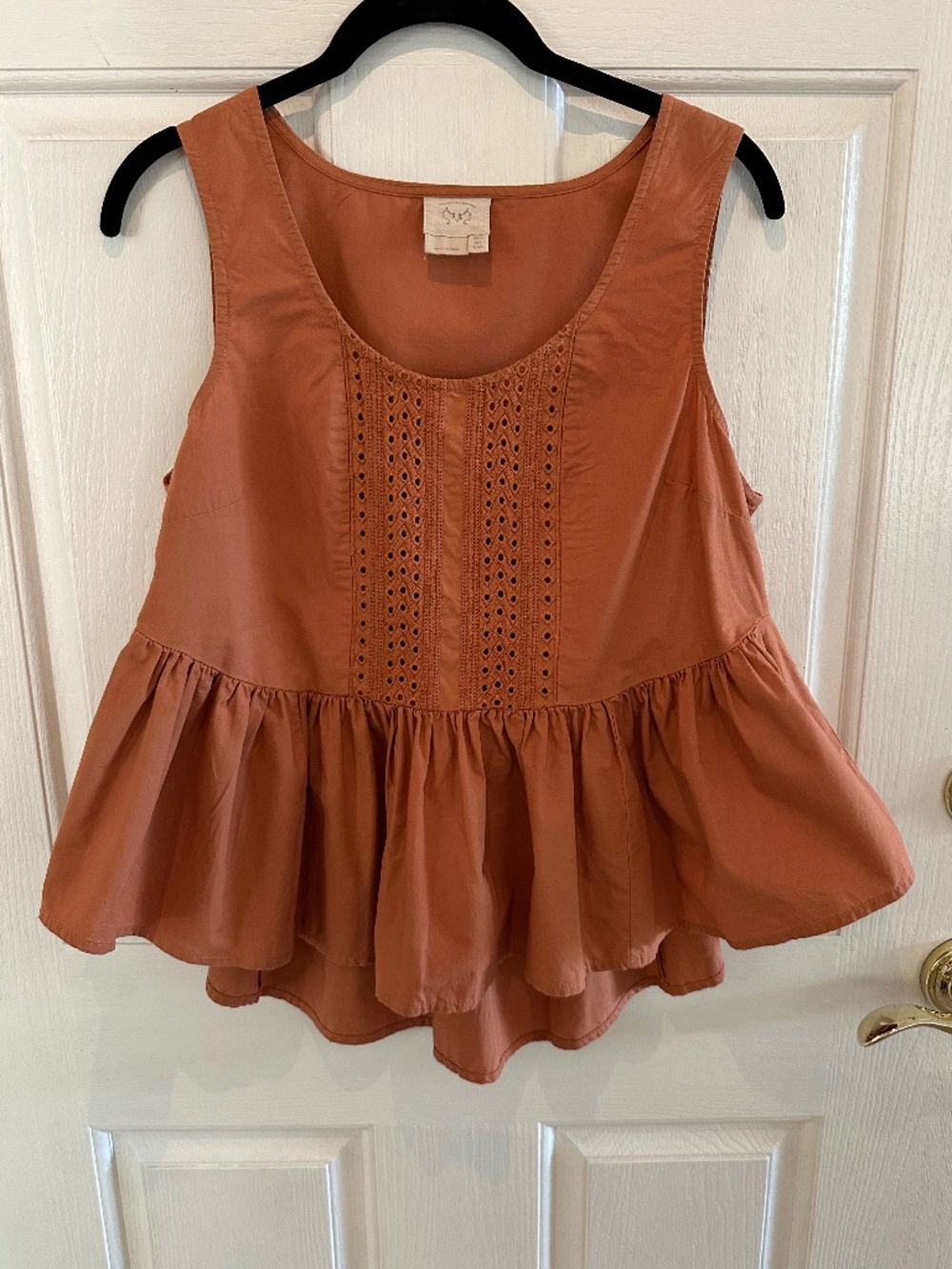 Vanessa Virginia sleeveless peplum blouse